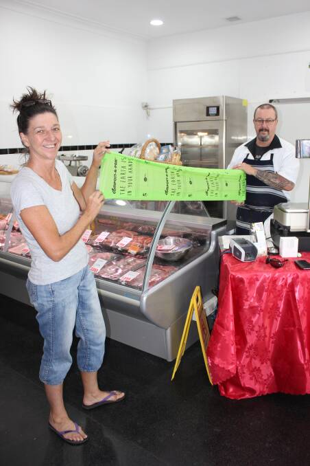 ALTERNATIVE: Michelle Dado-Millynn from Single Use Plastic Free Dungog (SUPFD) with Westwood Dungog Providores butcher Dave Roberts and the new bags.