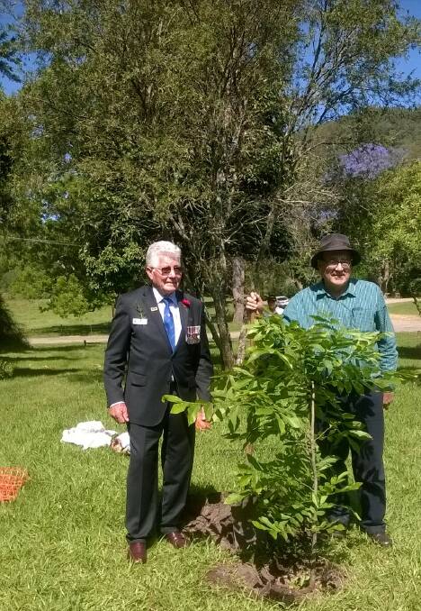John Casey of Gresford RSL Sub-branch and Cameron Archer, President, Paterson Historical Society following the planting of a pecan nut tree in John Tucker Park, Paterson, on Armistice Day, 2018.