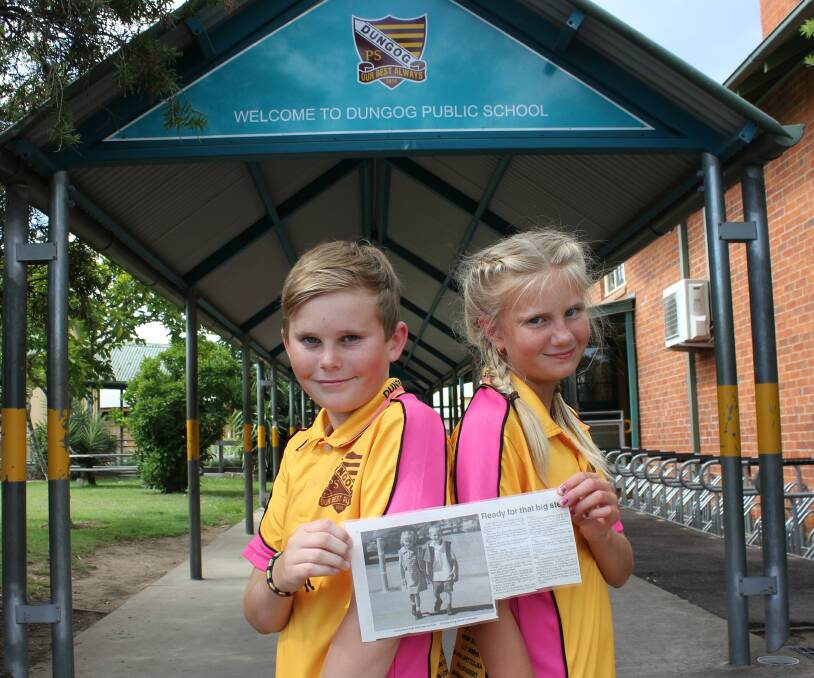 TIME FLIES: Jyden Neilson and Kelly Simmonds with the Dungog Chronicle article about them starting kindergarten.