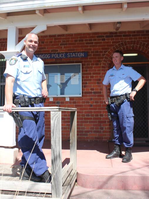 WELCOME: Constable Tim Houtsma is on the job at Dungog, pictured with Senior Constable Mitch Parker, left.