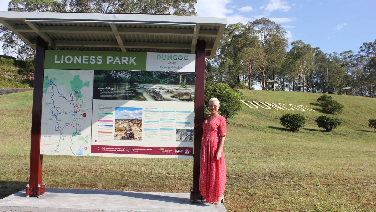 NEW: Dungog and Distract Chamber of Commerce President Jennifer Lewis with the new sign in Lioness Park.