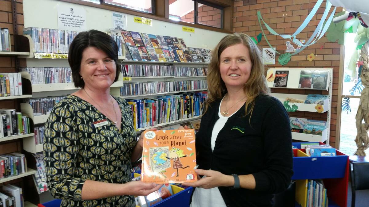 Donation: JR Richards and Sons Waste Education Officer Megan Richards (right), pictured with Dungog librarian Amanda Field, will donate a range of new books.