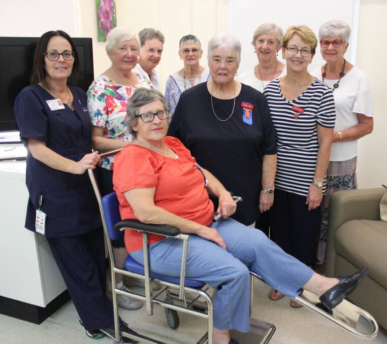 SAFE: Dungog Hospital Registered Nurse Patricia Whitehead with Hospital Auxiliary members who fundraised to buy a special chair.