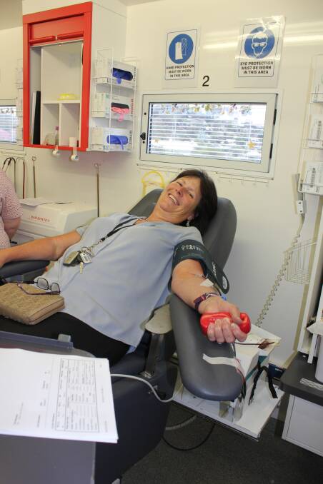 DONOR: Dungog's Jan Hunter did her bit when the Australian Red Cross mobile bus was at the Dungog Memorial Bowling Club  last week, making her 56th blood donation.