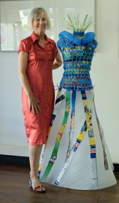 RECYCLED FASHION: Liz Hughes pictured with her wearable art, The Wicked Witch of Waste, which is on display at the Dungog By Design Gallery in Dowling Street. 