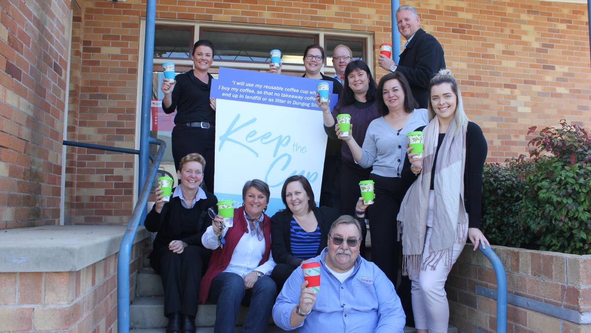 Cheers: Dungog Shire Council staff have embraced the re-usable coffee cup idea.