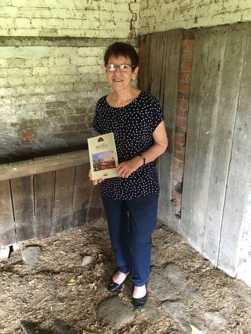 RESEARCH: Author Jean Arthur at Tocal with her book.