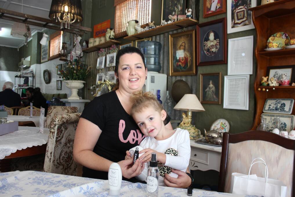 MOTIVATED AND NOMINATED: Kez Lucas, pictured with her youngest daughter, Zahra, aged 4, at the Clarence Town cafe.