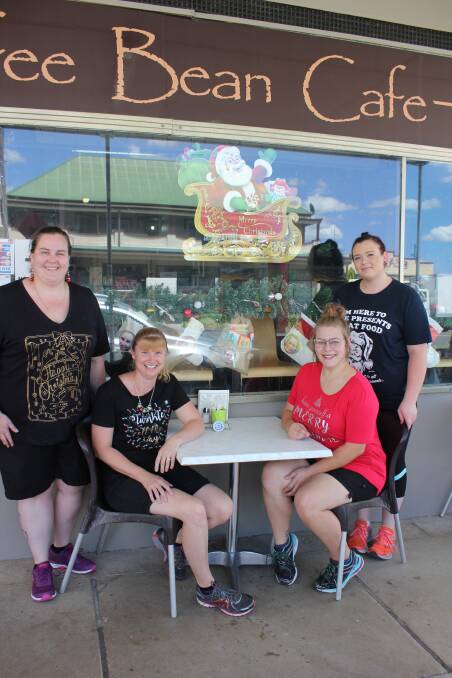 Brewing joy: The staff at the Coffee Bean, pictured here with their 2017 display. Businesses have a chance to win prizes as do shoppers who can vote on the displays.