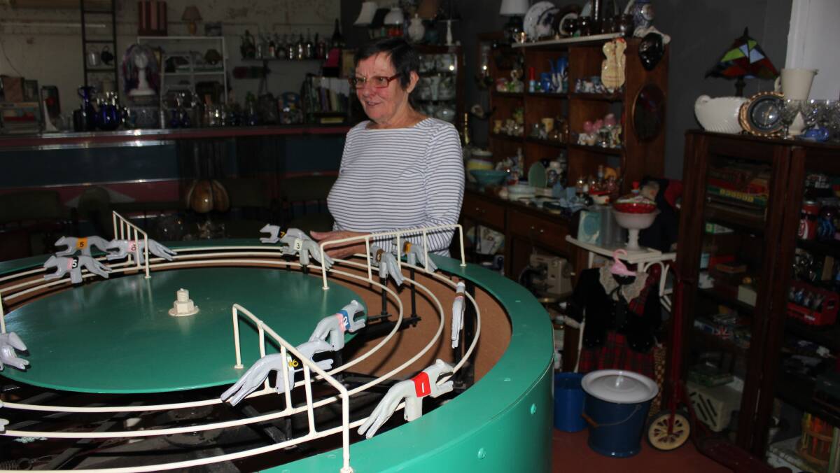Memories: Jackie Bayne with the restored Sid Davey racing wheel which was used as a fundraiser for the Dungog ambulance station and then the service club Apex.