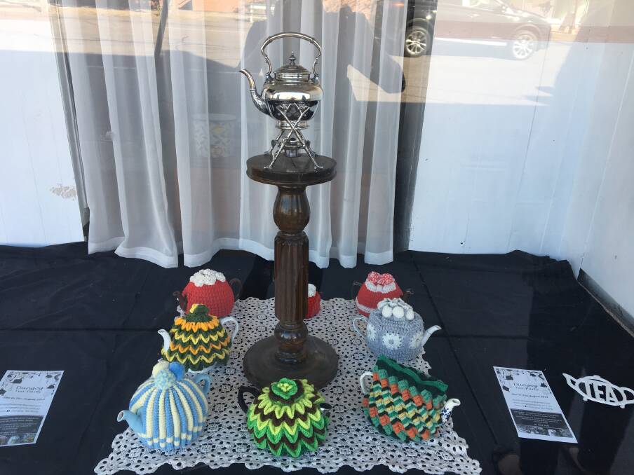 FUN: Businesses have been invited to dress up their windows and vie for the best dressed tea party window honours. This high tea display is at J and E Hawley Funerals.