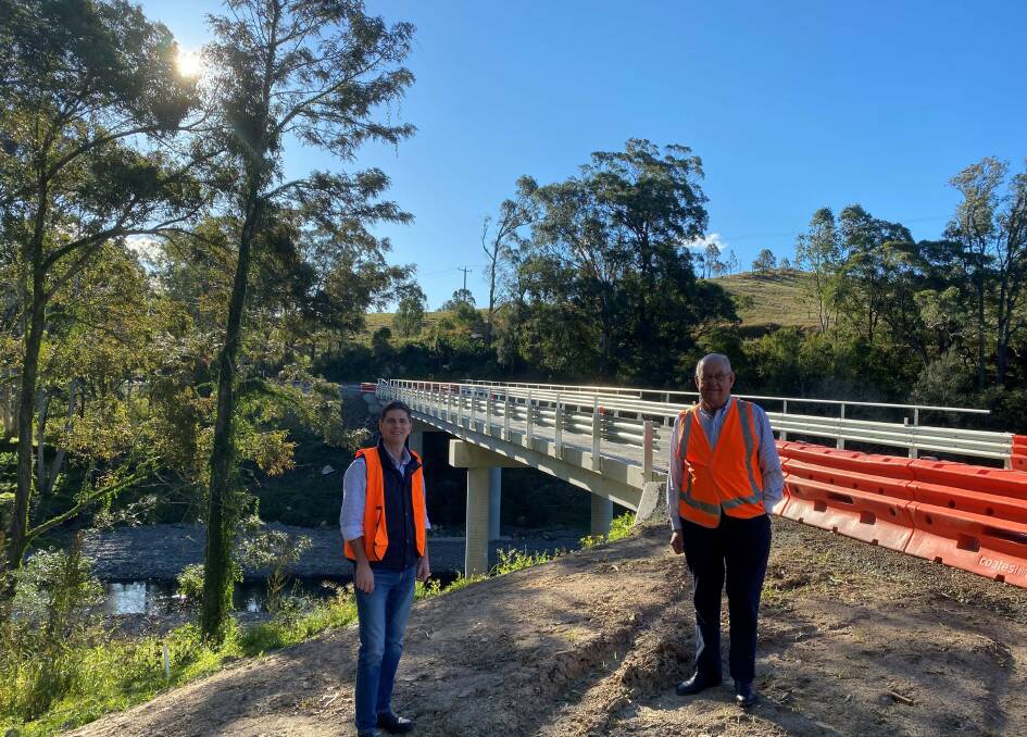 Open: Member for Upper Hunter Dave Layzell with Dungog mayor Cr John Connors at the new Tillegra Bridge which has a higher load limit.