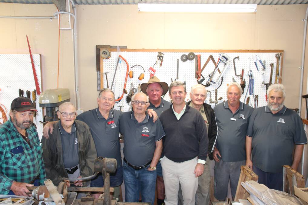 FUNDING DELIVERY: Joe Harris, Max Grills, Mick Collins, Eric White, Glenn Cummings, David Gillespie MP, Ross Godber, Wayne Guise, Gordon Aubrey discuss the Men's Shed latest funding boost and their activities.