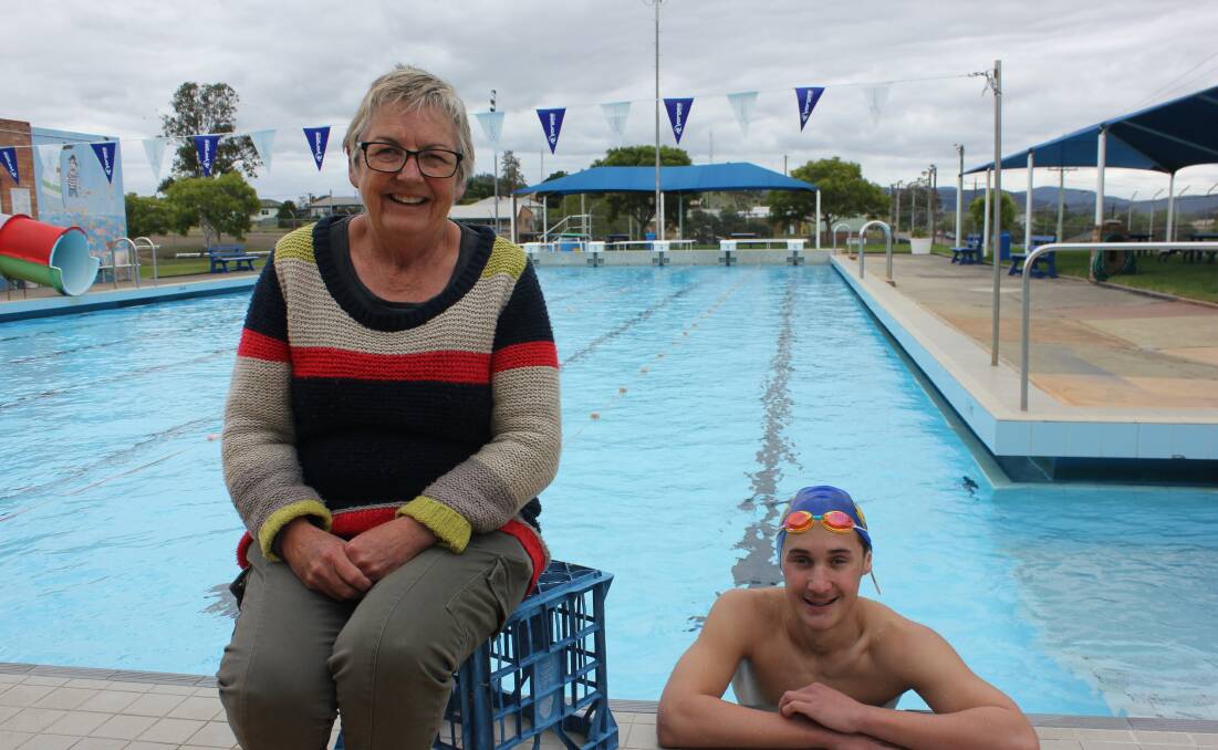 TRAINING LAPS: Bev Maytom chats to Raffa Francisci during a break from training at Dungog pool.