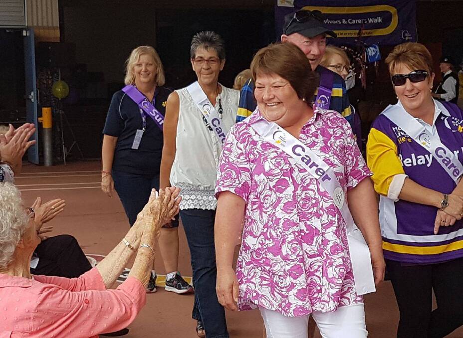 SUCCESS: Carers and survivors are clapped during the 2017 Relay for Life. Photo - Brittany Jones.