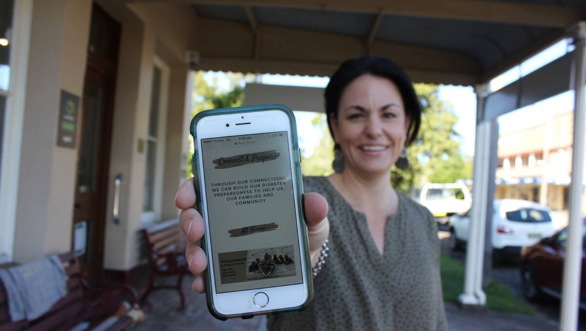 GET ONLINE:  Dungog Shire Community Centre Manager Sarah U'Brien with the new web page to help start the conversation. Picture: Michelle Mexon