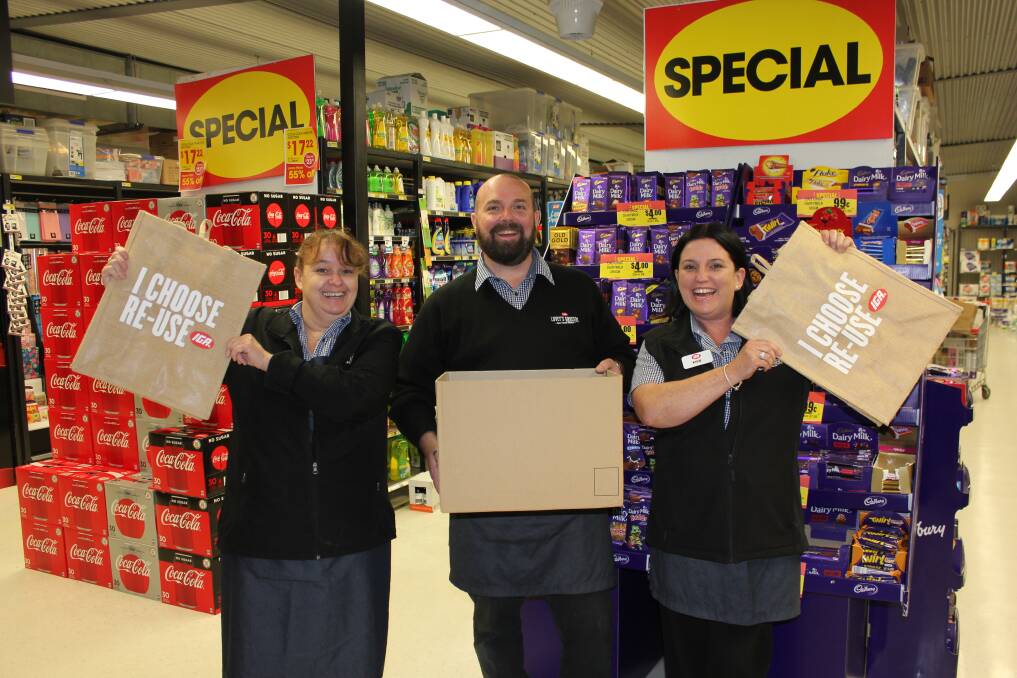 PLASTIC- FREE: Kim Hopson, Craig Stephenson and Kylie Thomas from Lovey's IGA Dungog show alternatives customers can use other than plastic bags. During the plastic free trial last year customers embraced the change with enthusiasm.