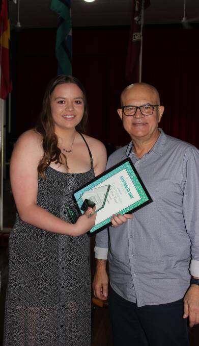 Junior: Hayley Forbes, named the Dungog Shire Junior Sports Award winner, with Australia Day ambassador John Stanley at the awards ceremony on Sunday.