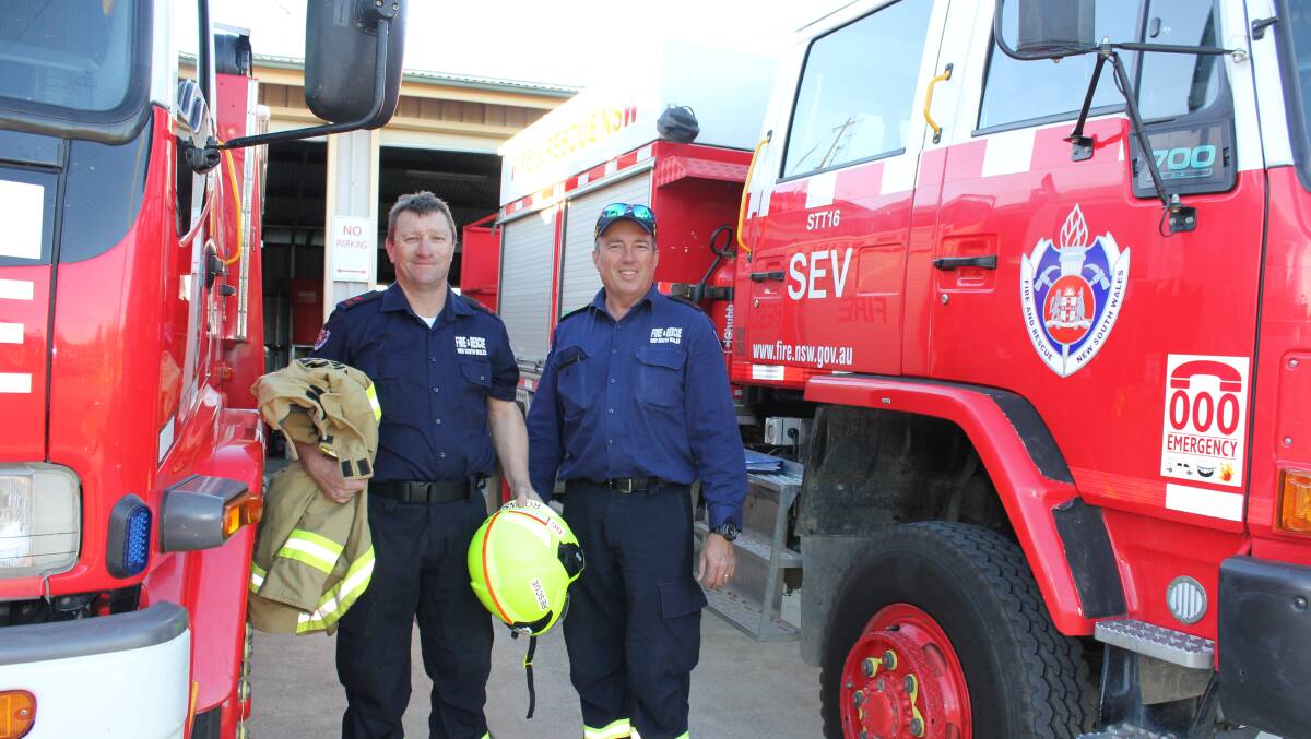 MEET THE FIRIES: David Robinson and David Wells from Dungog Fire and Rescue welcome residents to the station's annual open day this weekend.