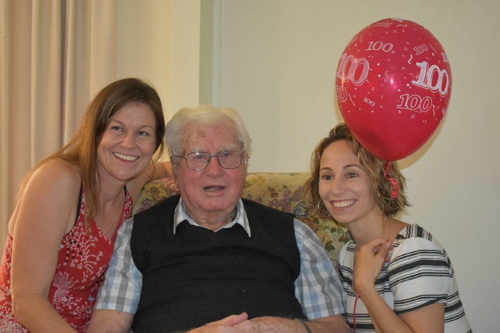 Milestone: Merv Marquet on his 100th birthday with two of his grandchildren, Sally Oakes and Rachel Jackson.