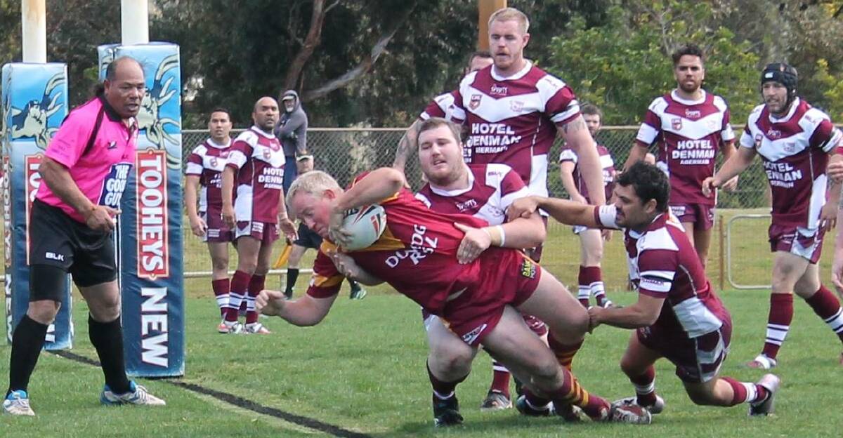 Dungog's Tim Harlow scores a try in the second half. Picture: Jeanie Briggs