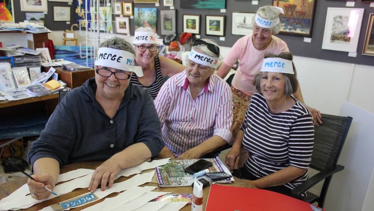 ART IS LIFE: Members of the arts society making the pro merger headbands. Julie Fitzgerald is front left.