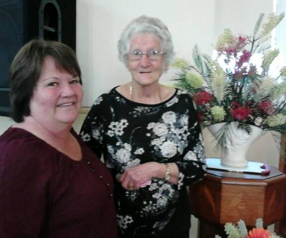 DELIGHT TO THE SENSES: Beth Elford, a visitor to the annual Uniting Church display, with artistic director Gloria Berry. Picture: Lurline Trustum