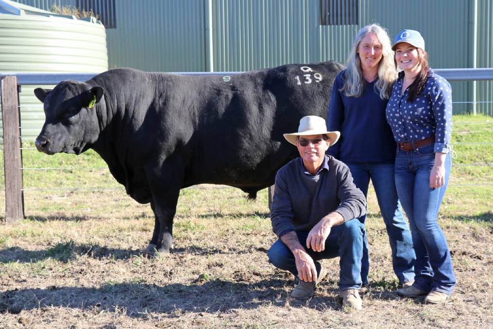 Sugarloaf Angus principals Jim, Sally and Beck Tickle with the top priced bull sold for $42,000 - Sugarloaf Timeless Q139 weighing in at 1008KG.
