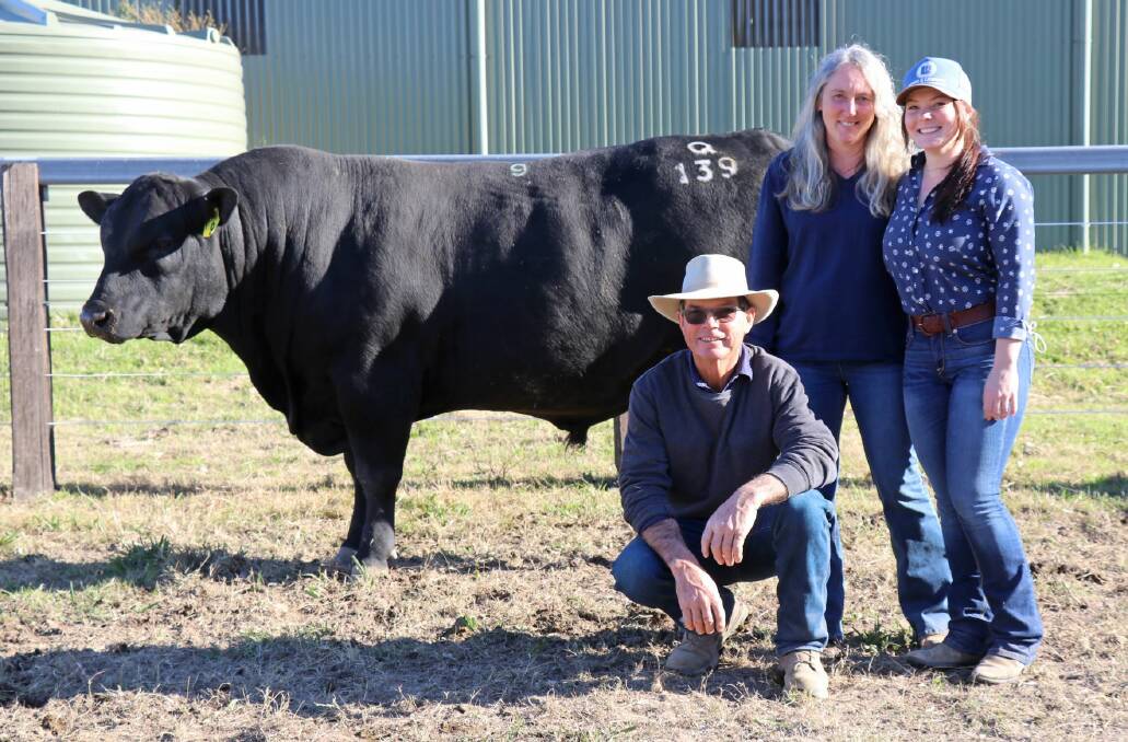 Sugarloaf Angus principals Jim, Sally and Beck Tickle with the top priced bull sold for $42,000 - Sugarloaf Timeless Q139 weighing in at 1008KG.
