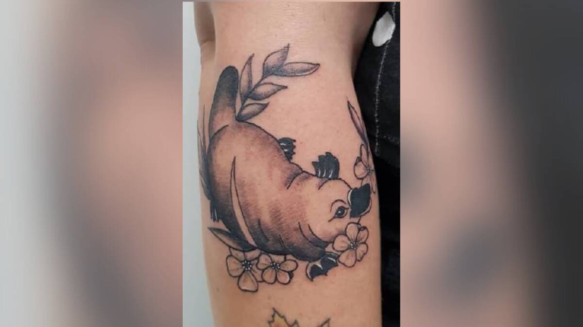 AMBER PULMAN: This platypus tattoo represents Australia, Amber Pulman becoming a citizen and finding her home here. Photo: Supplied.