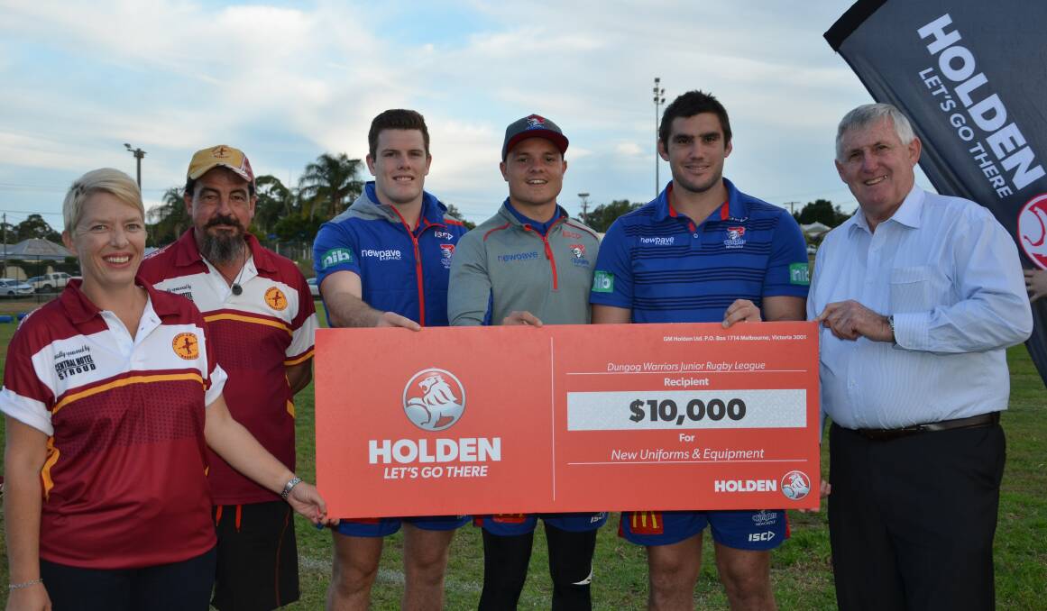 MONEY FOR CLUB: Lenny Argent, Lindy Hunt, Graham Turner with Newcastle Knights players Kade Snowdon, Jaelen Feeney and Lachlan Fitzgibbon at the cheque presentation on Thursday.