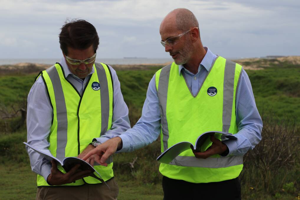 The plan: Water minister Kevin Anderson and Hunter Water managing director Darren Cleary discuss the Lower Hunter Water Security Plan. Picture: Hunter Water. 