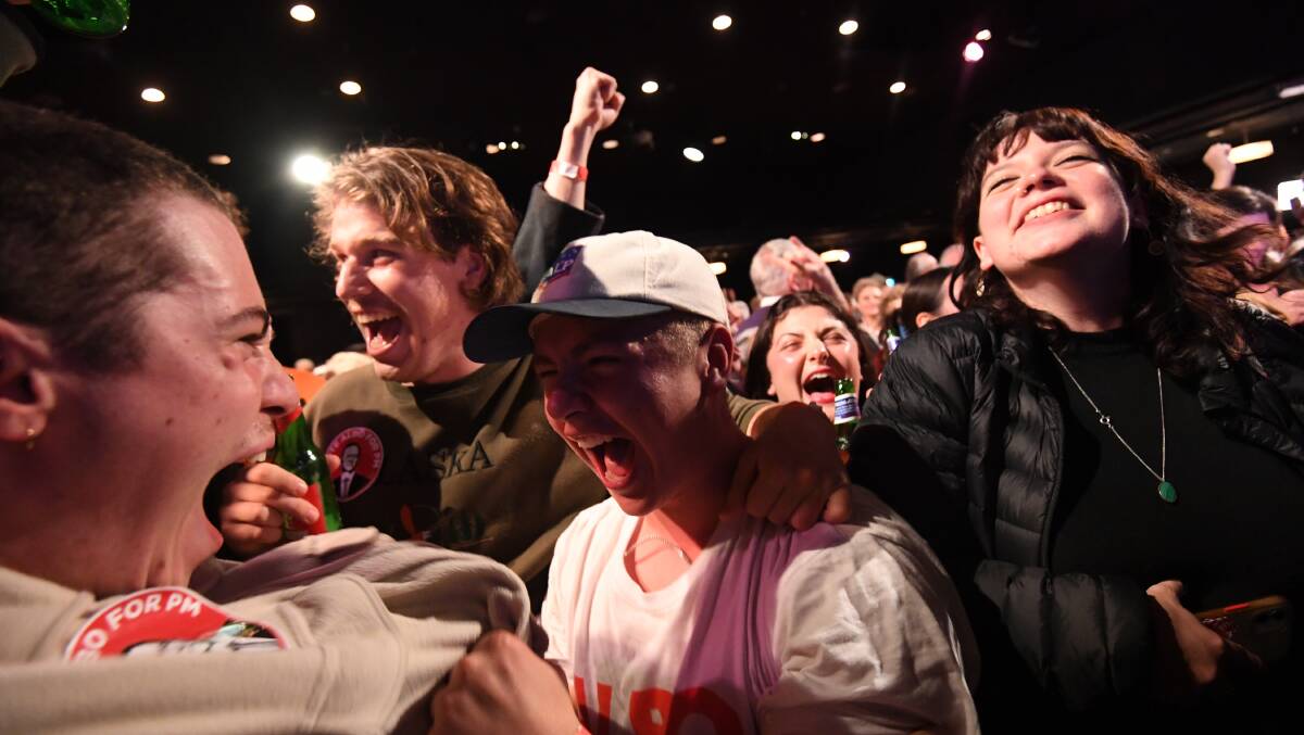 Labor supporters celebrate at the party's official function in Sydney. Picture: AAP