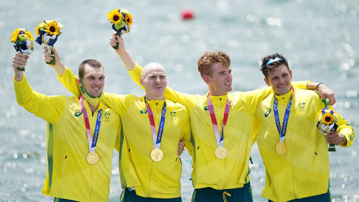 CHAMPIONS: Dungog rower Spencer Turrin, second from left, with the Aussie men's fours team after claiming Olympic gold in Tokyo. Picture: AAP Image/Mike Egerton