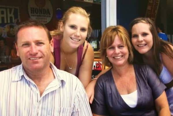 Happy: Tony Jenkins, wife Sharon and daughters Cidney and Kim during happier times.