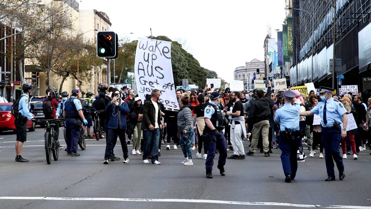 Protesters gathered en masse in Sydney to rally against lockdown measures. Picture: Getty