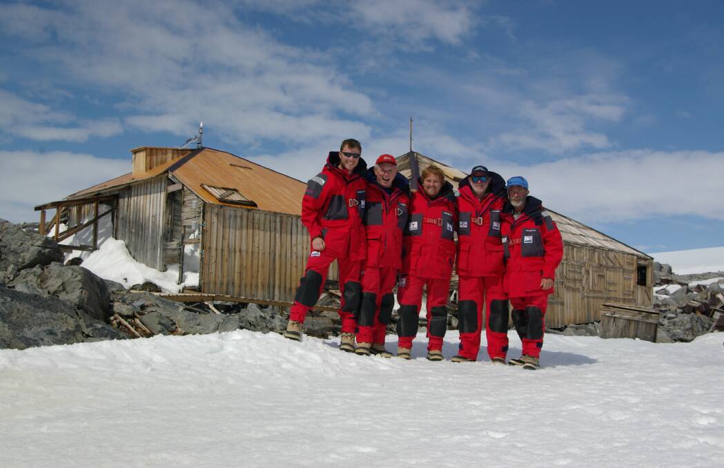 Graham Murphy and his fellow adventurers outside Mawson's huts in Antarctica in 2004. Picture: Courtesy, Graham Murphy