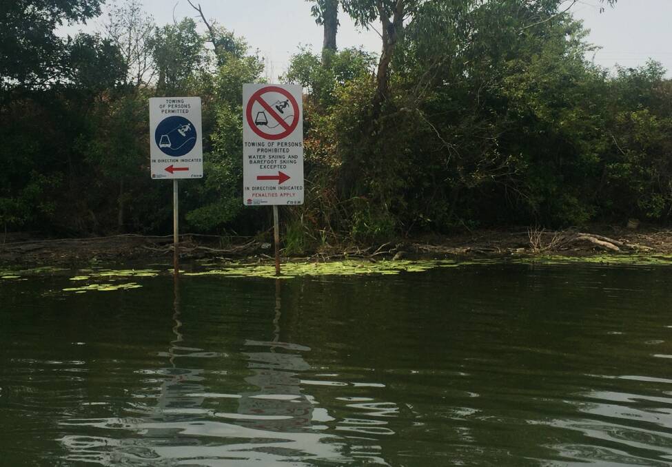 LIMITS: Wakeboarding and water skiing signs on the Williams River. Picture: Scott Bevan