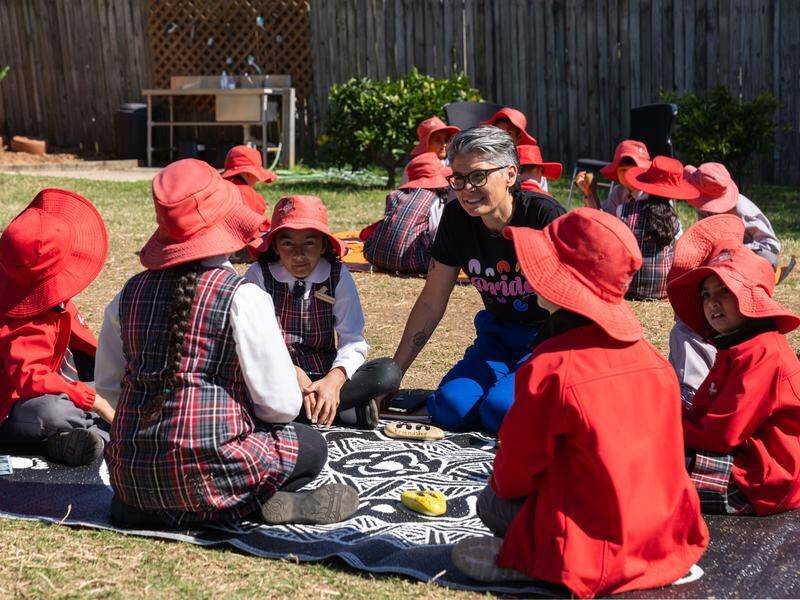 Reconciliation Australia director Sharon Davis (centre) visits a NSW school. (HANDOUT/WIRRIM MEDIA)