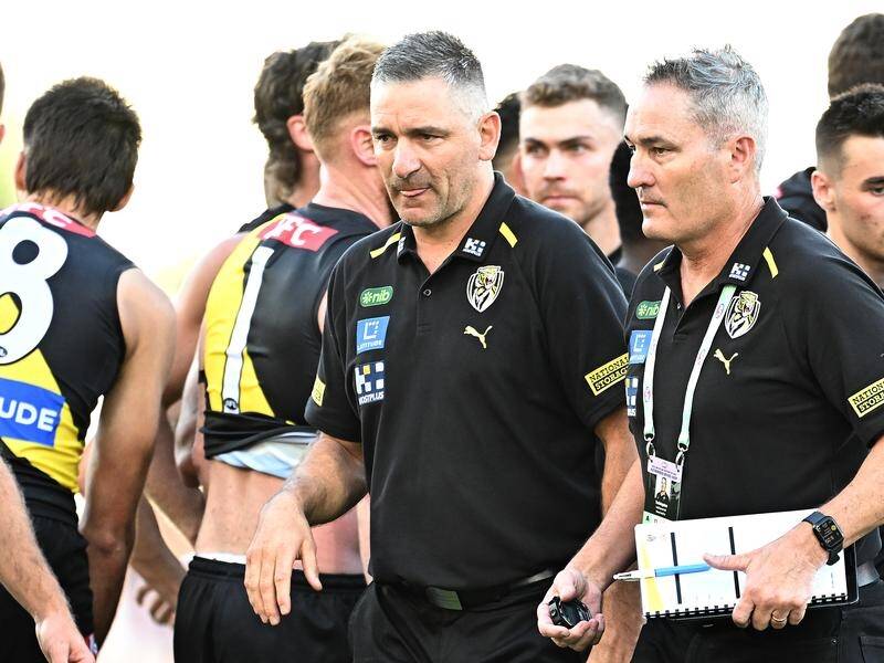 Adem Yze (L) needs an upset over Sydney to avoid being the first Tigers coach since 2010 to be 0-4. (Dave Hunt/AAP PHOTOS)