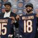 Top draft pick Caleb Williams poses alongside Rome Odunze with their Chicago Bears jerseys. (AP PHOTO)