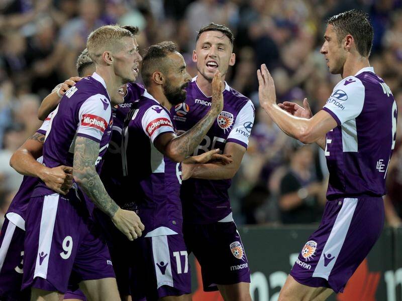 Perth Glory lead the A-League by nine points after their 4-0 win over Brisbane Roar.