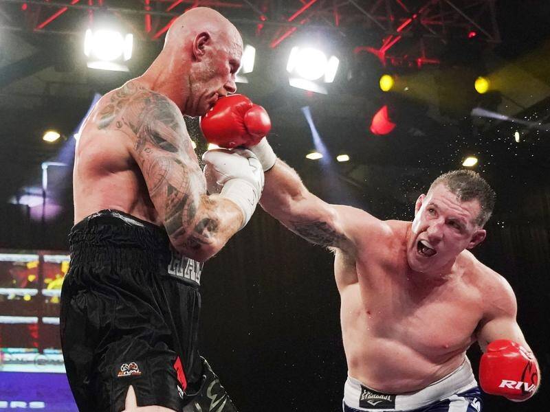 Paul Gallen (right) called for new judges after his fight with Barry Hall was ruled a majority draw.