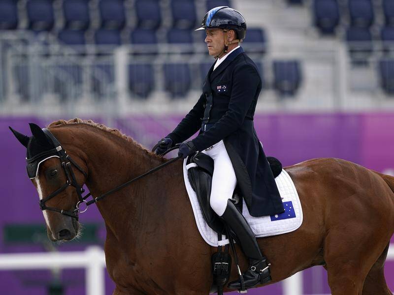 Andrew Hoy has helped move Australia to sixth in the Tokyo Olympic eventing teams after dressage.