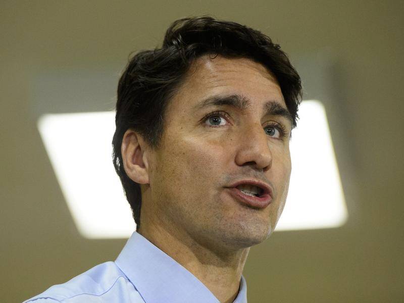 Canadian leader Justin Trudeau says he's sorry for putting on brown-face make-up in 2001.