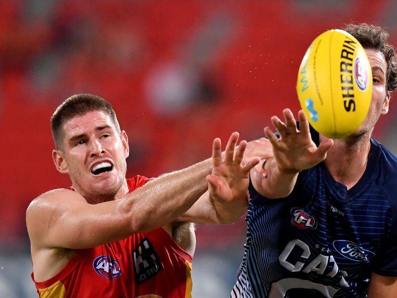Experienced ruckman Zac Smith could make his AFL return from injury when Gold Coast face Sydney.