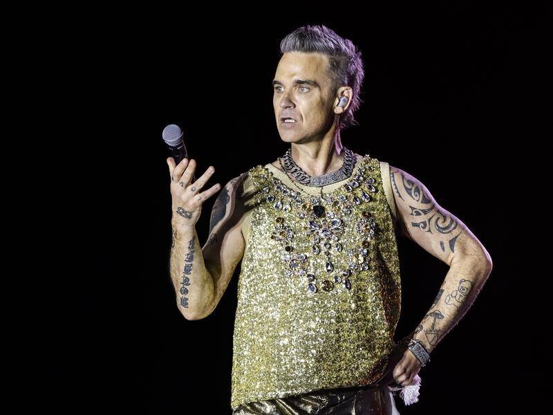 British pop star Robbie Williams has relived his troubled past in a new Netflix documentary. (EPA PHOTO)