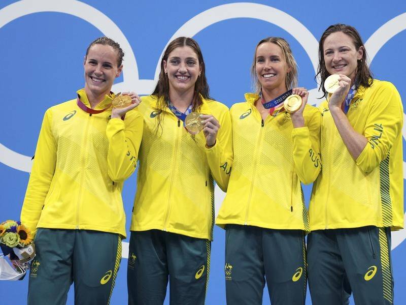 Australia's winning 4x100m freestyle relay team were told they could briefly remove their masks.