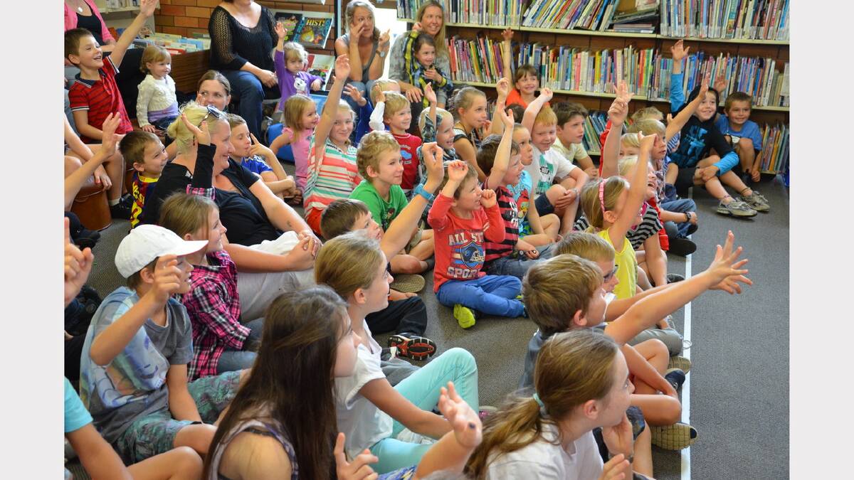 An eager crowd watching magician Joel Howlett perform at Dungog Library on Wednesday