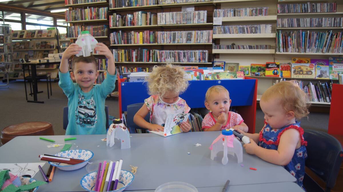 Children at Dungog Library enjoy a craft activity after story time.